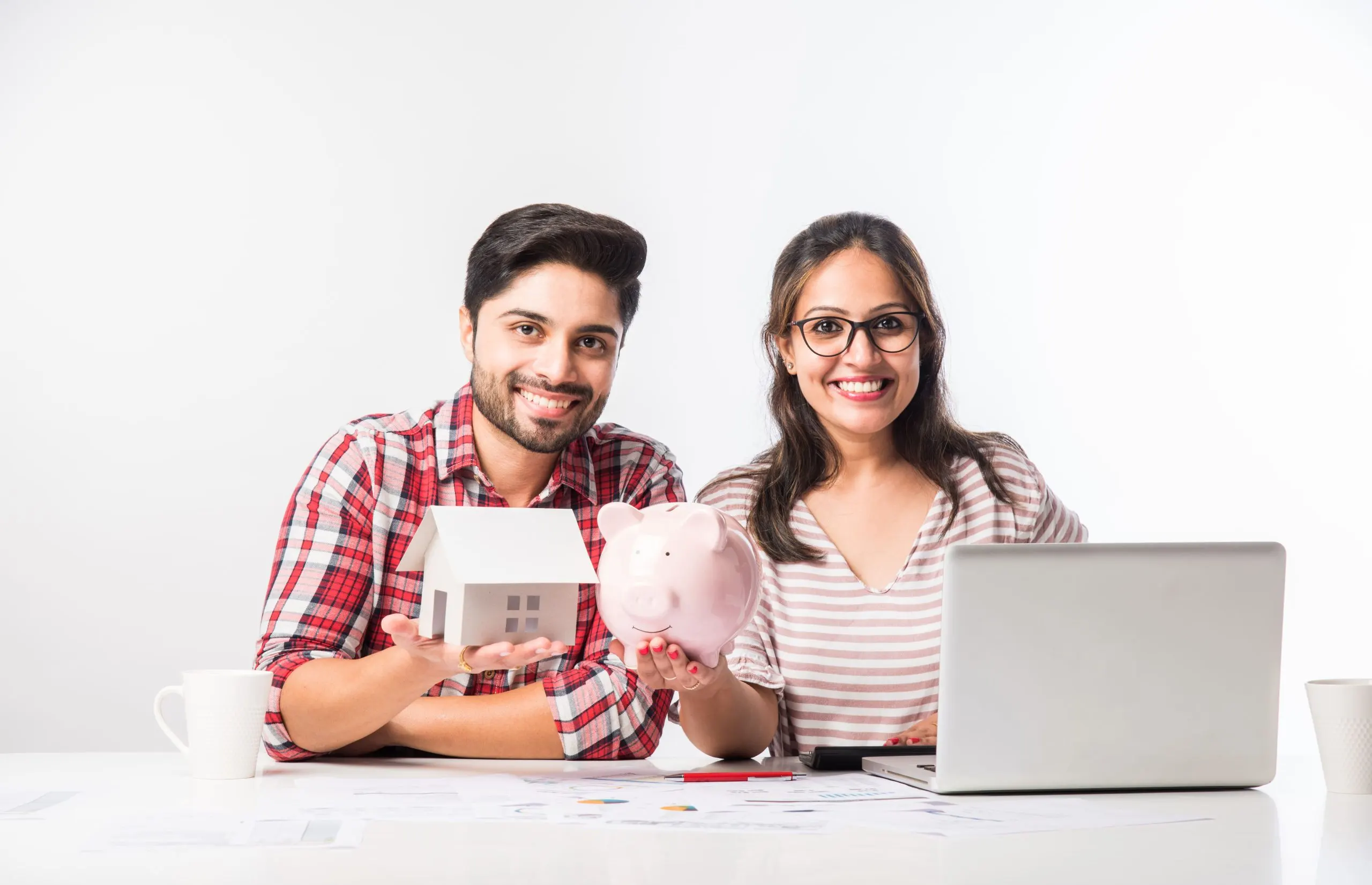 India Peer-to-Peer Lending Market Outlook to 2030 focused-indian-young-couple-accounting-calculating-bills-discussing-planning-budget-together-using-online-banking-services-calculator-checking-finances-1-scaled